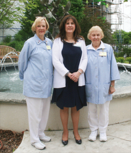Right to left: Volunteers Kay Keller (left) and Julie Kolinski (right) with RN and director of Volunteer Services Sue Schuelke.